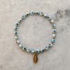 Pulsera de ojo turco azul Íris con separadores dorados de acero inoxidable