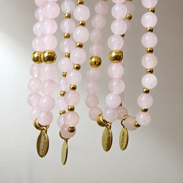 Pulseras de cuarzo rosa natural con detalles dorados