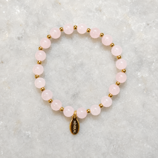 Pulsera de cuarzo rosa natural Esencia con detalles dorados